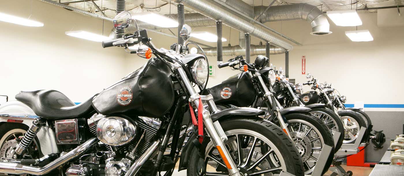 An image of Harley-Davidson motorcycles in a lab at Motorcycle Mechanics Institute in Phoenix, Arizona